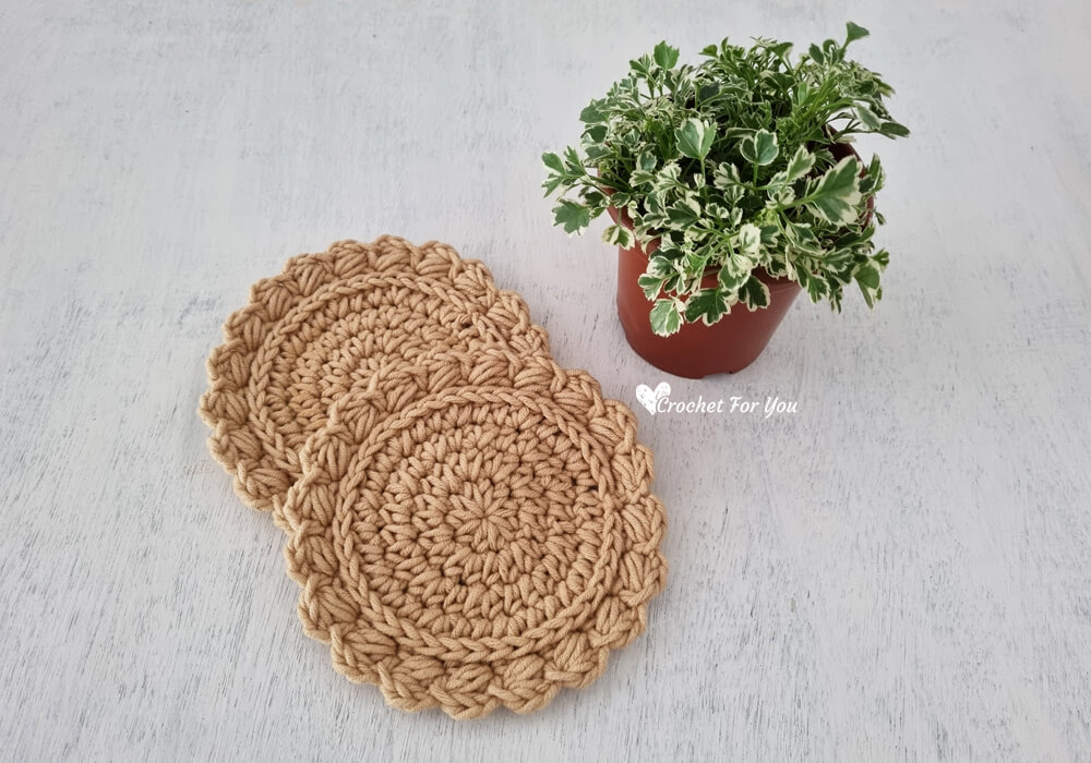 Simple and modern crochet coaster in a warm neutral color