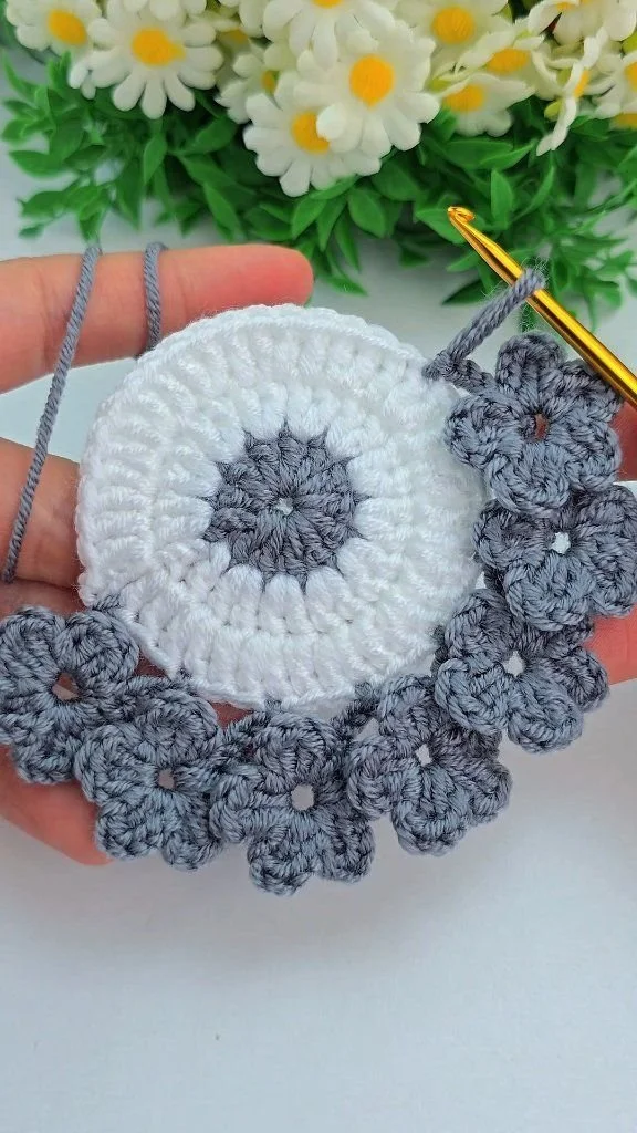 Delicate crochet flowering motif design in pastel colors